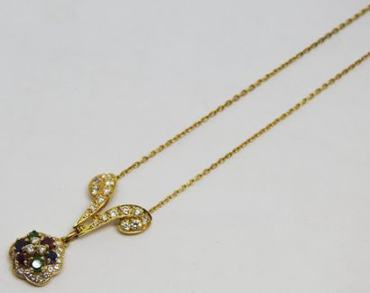 null Necklace in yellow gold 18K (750 thousandths) in the motives in scroll paved...