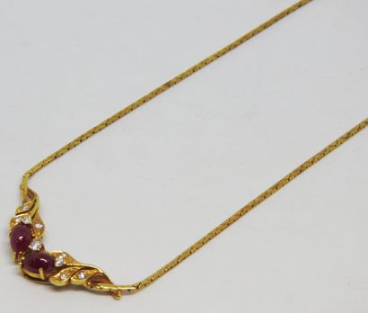 null Necklace in yellow gold 18K (750 thousandths) in the leafy motives heightened...