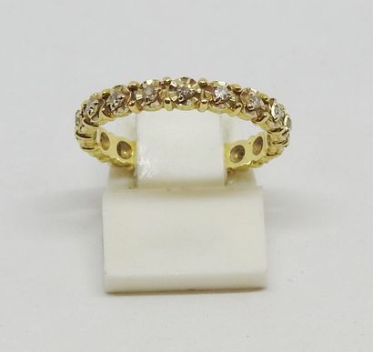 null American wedding ring in yellow gold 18K (750 thousandths) set with diamonds...
