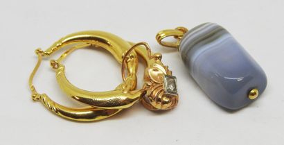 null Lot in yellow gold 18K (750 thousandths) comprising a pair of creoles and a...