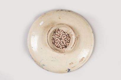 null FES, Morocco.


Terracotta, earthenware enamel.


Slightly hollow circular dish...