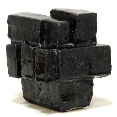 null Eric ASTOUL (born in 1954) 

Composition cubisante.

Stoneware with black glaze.

Monogrammed.

H....