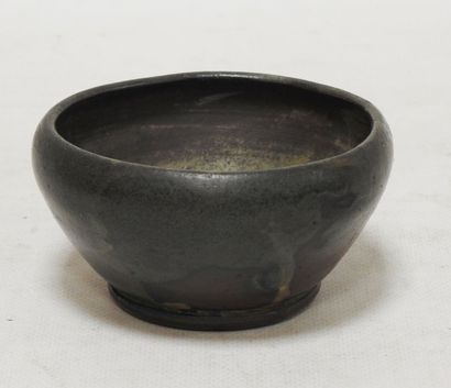 null Nils de BARCK (1863-1930)

Stoneware bowl with brown and green glaze.

Signed...