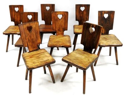 null Brutalist work 

Suite of 8 chairs in natural wood, openwork back with heart...