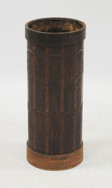 null Cane holder of cylindrical shape in embossed leather with Art Nouveau patterns...