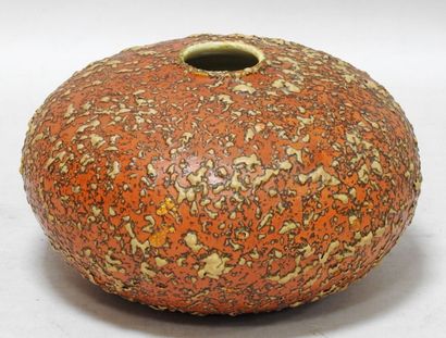 null Work of the 70's

Vase with flattened body with orange and brown lumpy cover.

H....
