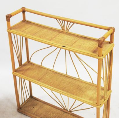 null Work of the 80s

Rattan set including a wall shelf of rectangular shape with...