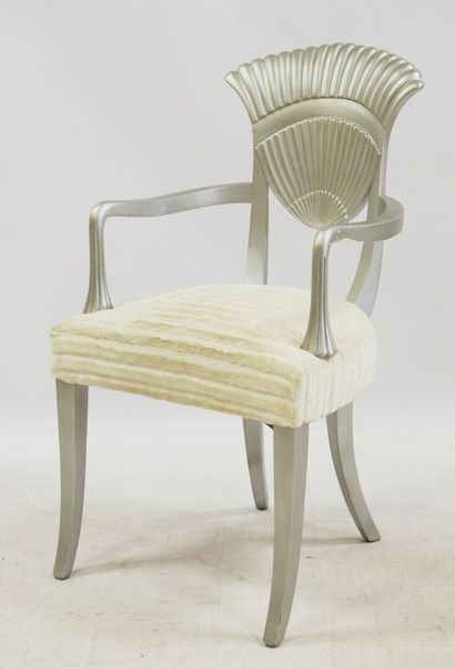 null Work of the 80s

Three "lotus" armchairs in silver lacquered wood, saber base,...