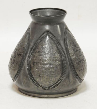null François CORTESI

Vase in pewter of ovoid form with geometrical motive worked...