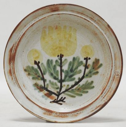 null Michel BARBIER (1931-2004)

Earthenware plate decorated with flowering branches

Signed...