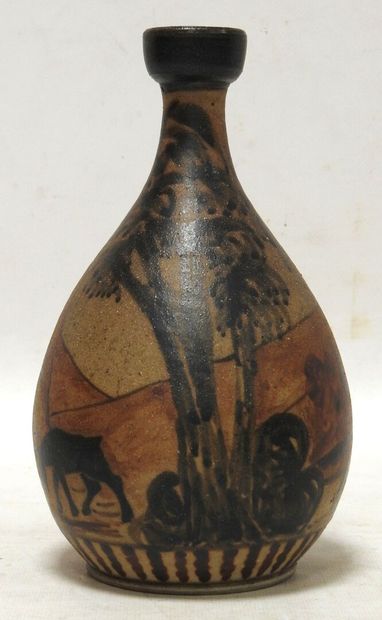 null CIBOURE

Vase en grès de forme ovoide à col renflé à décor d'un chasseur dans...