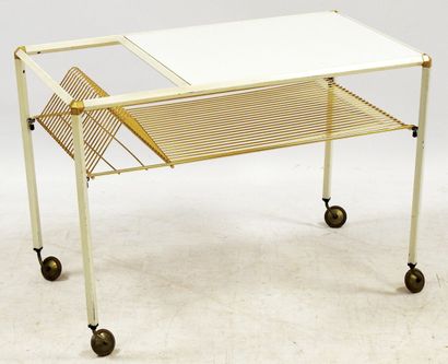 null Work of the 70s

Rectangular rolling table in white and gold lacquered metal...