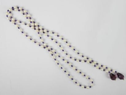 null SAUTOIR en perles de culture et perles violettes. Long. 120 cm env.