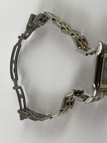 null CARTIER: "Panther" bracelet watch in 750/1000 gold and stainless steel, screw-set...