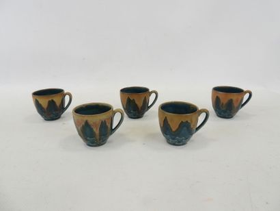 null DENBAC, Suite of five blue enamelled stoneware cups, marked under the base "...