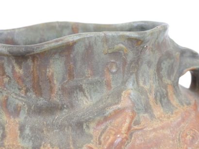 null Attributed to DENERT, stoneware planter with twisted handles, numbered under...