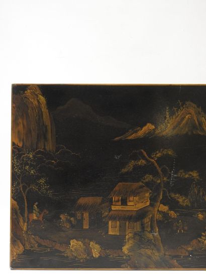 null CHINA. Black and gold lacquer panel decorated with a village with characters...