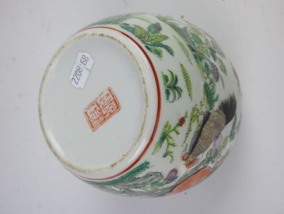 null CHINA - 20th century. Porcelain covered pot of ball shape with polychrome decoration....