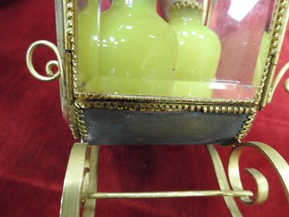 null Cage" box in beveled glass and brass decorated with a dragon, including two...