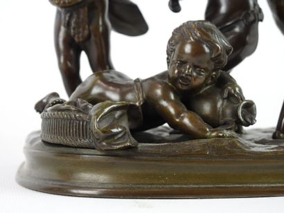 null SCULPTURE in bronze with brown patina representing four playing putti, accompanied...