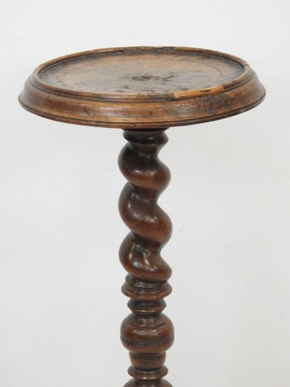 null Walnut TORCHER HOLDER, with a round tray in cabaret on a turned shaft in spiral...