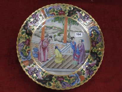 null CHINA: Suite of five porcelain plates with polychrome decoration of palace scenes,...