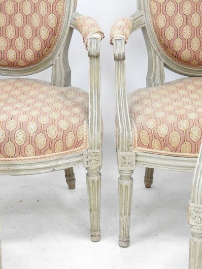 null Suite of FOUR armchairs with medallion backs in molded, carved and grey lacquered...