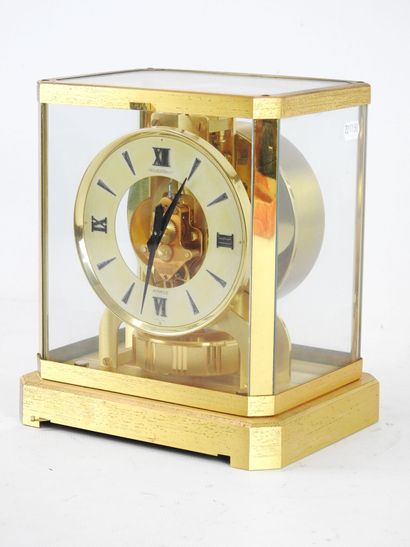 null JAEGER LECOULTRE: Atmos clock model cage in gilded brass, white dial with Arabic...