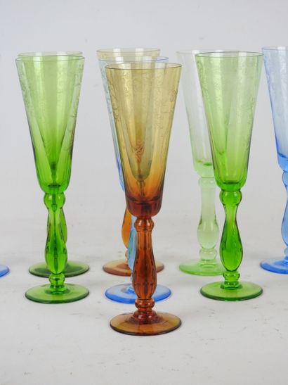 null 
RITZ - Paris : Nine crystal flutes of color : amber, blue and green, with decorations...