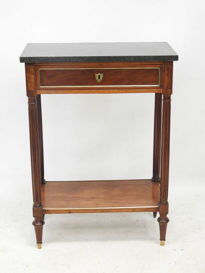 null CONSOLE in mahogany and mahogany veneer, decorated with gilded brass quarter...