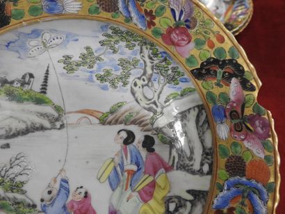 null CHINA: Suite of five porcelain plates with polychrome decoration of palace scenes,...