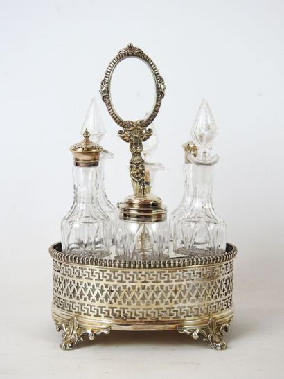 null NECESSAIRE A CONDIMENTS of oval form out of English silver plated metal including...
