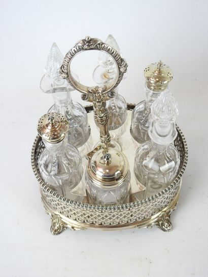null NECESSAIRE A CONDIMENTS of oval form out of English silver plated metal including...