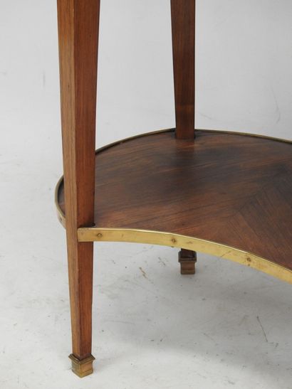 null Oval-shaped SALON TABLE, made of rosewood veneer and light wood fillets, opening...