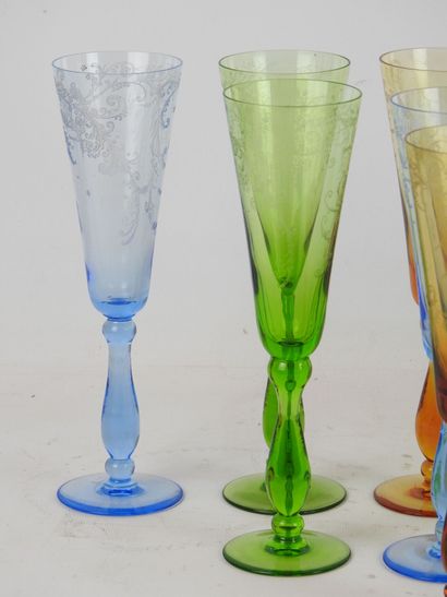 null 
RITZ - Paris : Nine crystal flutes of color : amber, blue and green, with decorations...