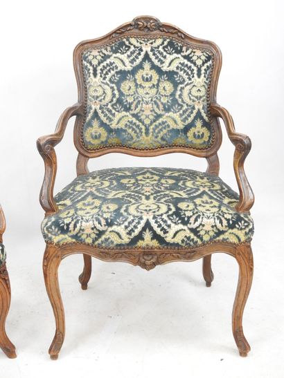 null Meeting of TWO armchairs in natural wood molded and carved with flowers and...