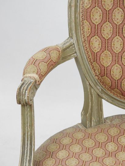 null Suite of FOUR armchairs with medallion backs in molded, carved and grey lacquered...