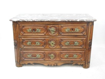 null COMMODE in molded and carved walnut with a crossbow front opening five drawers,...