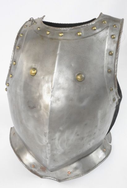 null LEATHER. Plastron and dossière in iron with brass rivets. In the style of the...