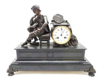 null MISCELLANEOUS. Mantel clock in black marble surmounted by a gentleman looking...