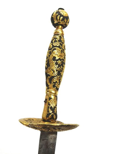 null FRANCE. Court sword with chased steel frame and all the parts in relief gilded...