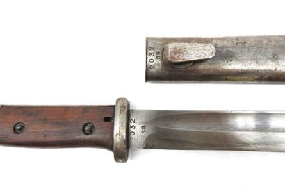 null GERMANY. Mauser 98 K bayonet with wooden plates, blade marked 43 ASW, iron scabbard...