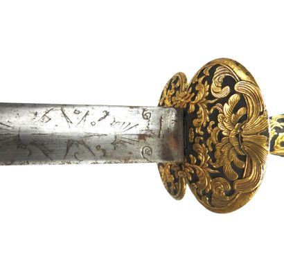 null FRANCE. Court sword with chased steel frame and all the parts in relief gilded...