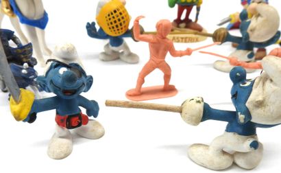 null FIGURINES. Lot of 17 various plastic figurines related to fencing or sword fighting...