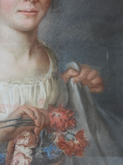 null FRENCH SCHOOL OF THE XIXth CENTURY: Portrait of a young woman with carnations....