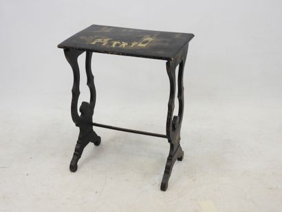 null LITTLE TABLE in lacquered wood with a lyre base, the top decorated in the Chinese...