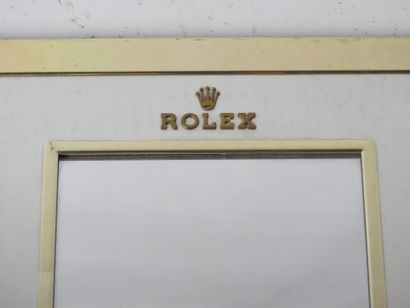null ROLEX : Miroir rectangulaire en métal doré et argenté. Années 1970. 39 x 32...