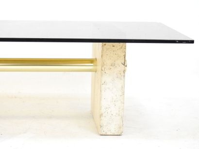 null LOW TABLE with rectangular top in smoked glass resting on two travertine feet...