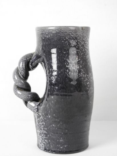 null ACCOLAY : Ceramic pitcher with purple glaze and twisted handle. Signed and annotated...