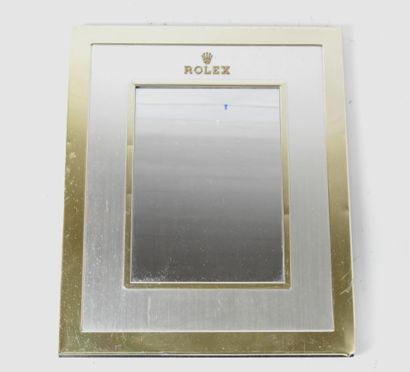 null ROLEX : Miroir rectangulaire en métal doré et argenté. Années 1970. 39 x 32...